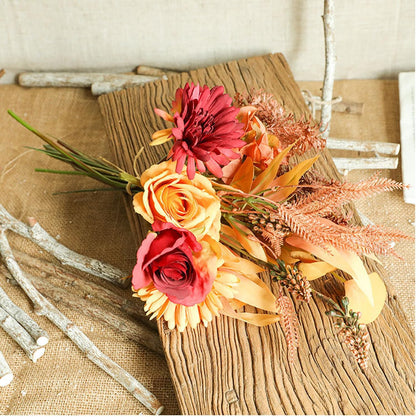 Künstliche Blumenarrangements mit Rosen und Chrysanthemen in Glasvase für stilvolle Tischdekoration und Wohnräume
